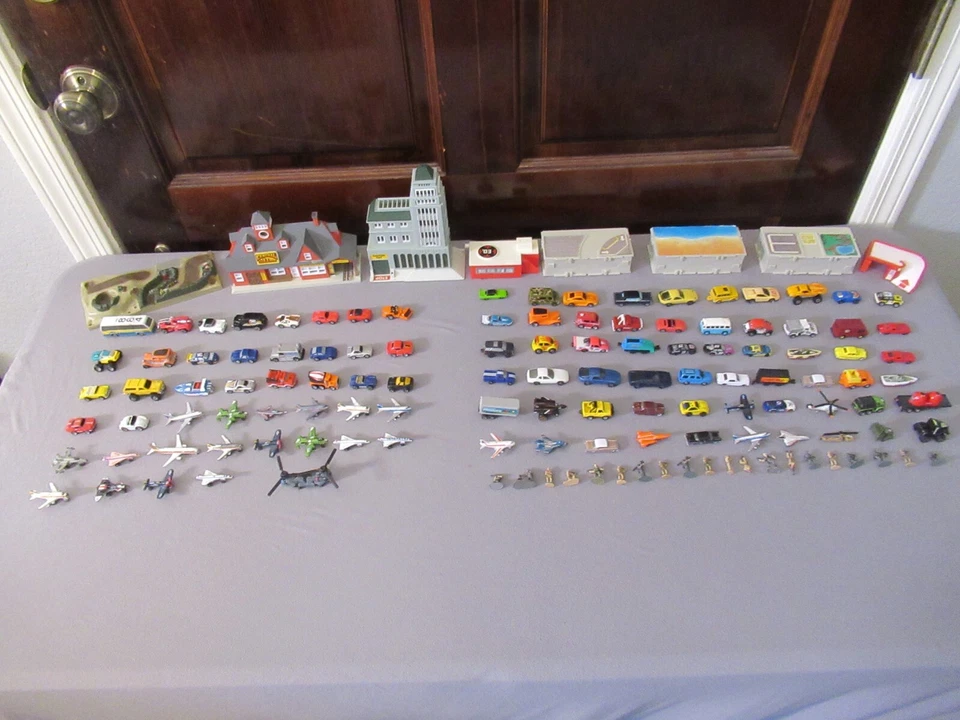 Galoob Micro Machines Lot Of 133 PIECES Mini Cars PLANES HELICOPTER & MORE - Image 1 of 4