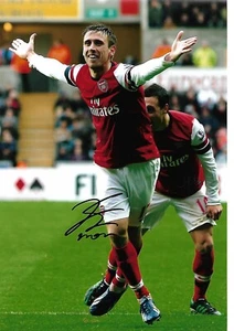 Autógrafo firmado a mano Carl Jenkinson 12x8 foto Arsenal certificado de autenticidad - Imagen 1 de 1