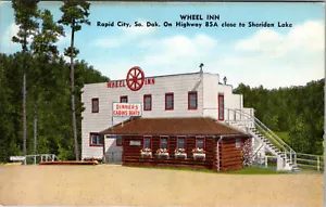 RAPID CITY, SOUTH DAKOTA - WHEEL INN ROADSIDE CABINS & RESTAURANT LINEN POSTCARD - Bild 1 von 2