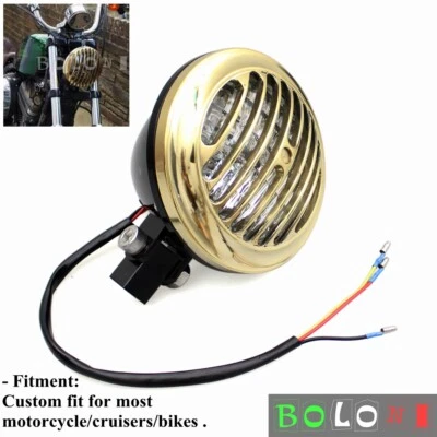 Faro de latón personalizado para motocicleta con aletas parrilla luz principal para Harley Café Racer Foto 1 de 4