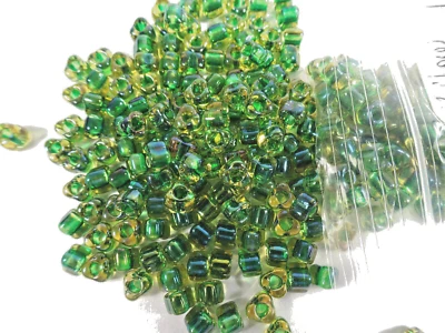 100 Miyuki Transparent Color-Lined Amber & Green Glass TRIANGLE BEADS - Image 1 of 2