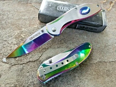 FACA DE BOLSO FEMININA PONTA GOTA ÓLEO ARCO-ÍRIS ASSISTIDA POR MOLA EDC 3CR13 - Imagem 1 de 4