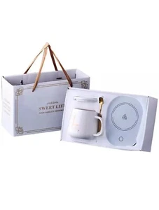 SET SCALDACAFFÈ TAZZA CAFFÈ CON SACCHETTO REGALO RISCALDAMENTO MONTAGNE RUSSE PER BIBERON TÈ LATTE... - Foto 1 di 5