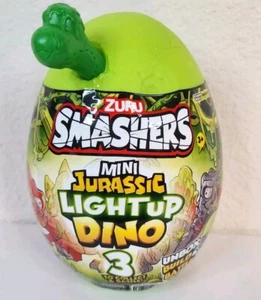 ZURU Smashers Mini Jurassic Light Up Dino Over 6 Surprises Inside - Picture 1 of 5