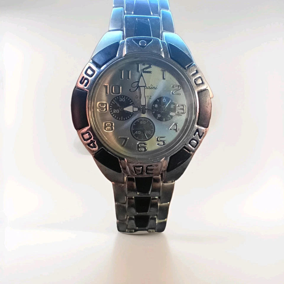 Reloj de cuarzo Fondini de acero inoxidable piezas suizas correa de metal negro y plateado Foto 1 de 3