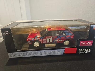 Sun Star escala 1/18 3105 - Lancia Delta HF Intergrale 1989 Martini Baison #1 - Imagem 1 de 4