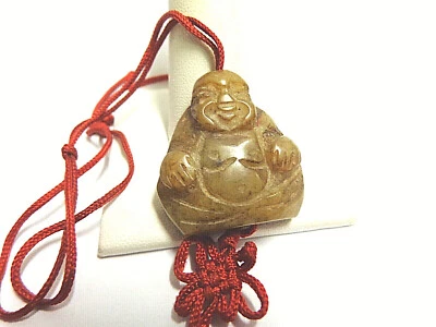 Vintage jade budha Netsuke  sz 1 1/8 in lg wgt11 grams brown on red cord - Image 1 of 4