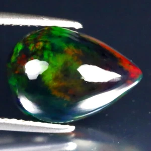 4.84 ct Phenomenal Pear Cabochon (14 x 10 mm) Ethiopian Flashing Black Opal - Picture 1 of 2