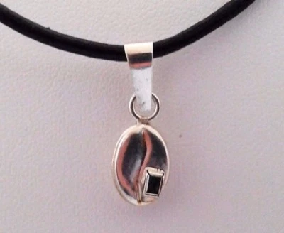 Semi d'argento con smeraldo - Immagine 1 di 4