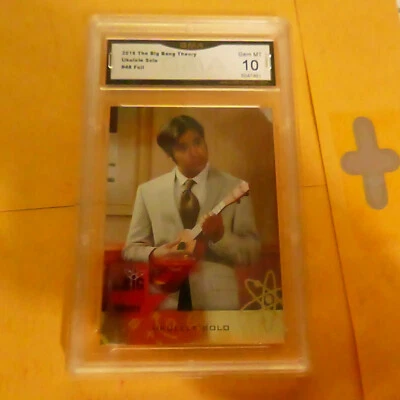 UKULELE SOLO RAJ 2016 THE BIG BANG THEORY FOIL # 48 GRADED 10 L@@@K - Image 1 of 2
