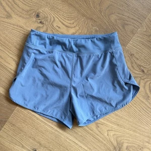Athleta Girl Shorts size Xl/14 Run The World 3" Short Blue - Picture 1 of 5