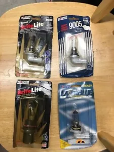 4 Headlight Bulbs - new in pkg - Wagner BP9006BL BP9004BL BP9005 9006BK 1 each - Picture 1 of 2
