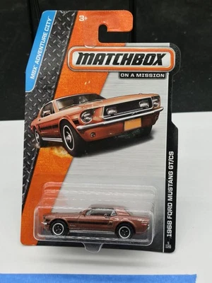2013 MATCHBOX MBX ADVENTURE CITY 1968 FORD MUSTANG GT/CS - BROWN - 5/120 - Image 1 of 2