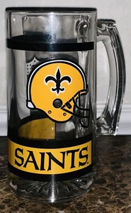 Taza de cerveza de vidrio de colección New Orleans Saints NFL transparente y dorada 5,5 pulgadas excelente - Imagen 1 de 2