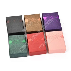 24 cajas de joyería rectangulares de cartón estuches de regalo patrón de moño 9x6,8 cm - Imagen 1 de 20