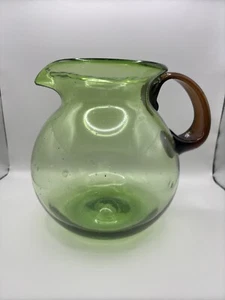 Vintage Hand-Blown Glass Pitcher Green With A Brown Handle - Picture 1 of 9