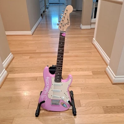 Hello Kitty Pink Squier mini guitar by Fender - Image 1 of 4