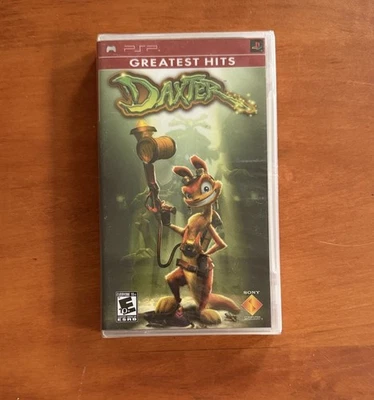 Daxter (Sony PSP) NUEVO Sellado de Fábrica - Excelente Estado NTSC - Envío Rápido Foto 1 de 4