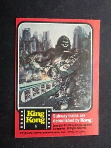 1976 Topps King Kong Card # 6 Subway trains are demolished by Kong! (EX)