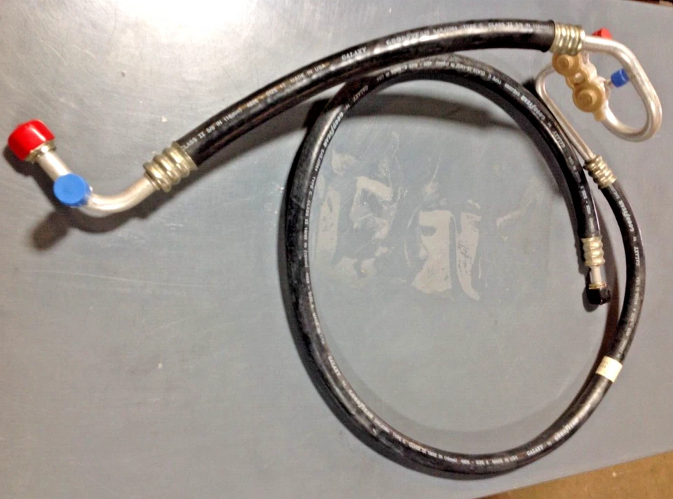 6005595 HUMMER H1 MANGUERA DE AIRE ACONDICIONADO-ASPIRACIÓN/DESCARGADOR Foto 1 de 1