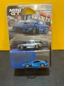 1/64 MINI GT CHASE CAR MAZDA RX-7 RE-AMEMIYA 20B 3ROTOR-7 AMA-SAN GO BLUE #1046 - Bild 1 von 2