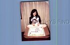 FOUND COLOR PHOTO M+4752 PRETTY WOMAN POSED BEHIND LARGE CAKE IN BOX