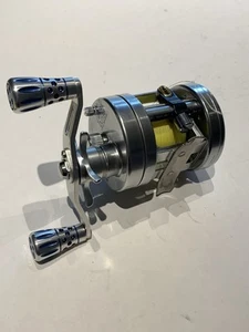 Tica Caiman DJ150 Fishing Baitcasting Reel W/ Neoprene Cover - Picture 1 of 5