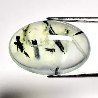 💎 Cabujón ovalado de 17,11 quilates Prehnita verde natural con agujas negras - gema de África Foto 1 de 4