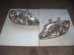 PAIR HONDA CIVIC 1999 2000 HEADLIGHT HEADLIGHTS TYC - Picture 1 of 1