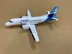 Gemini 200 Westjet Saab 340B G2WJA1245 C- GOIA nuevo color 1024 1:200 - Imagen 1 de 6