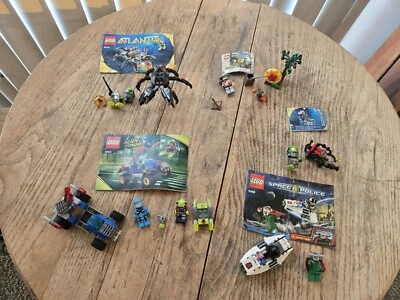 LEGO Lot Alien Conquest, Atlantis, Space Police Kingdoms Manuals 7050 Incomplete - Image 1 of 4