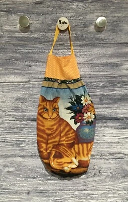 Bolsa de plástico para supermercado trapo calcetín soporte gato mermelada naranja flores atigradas en florero Foto 1 de 3