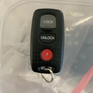 OEM 2000-2001 MAZDA MPV KEYLESS REMOTE ENTRY KEYFOB FOB TRANSMITER E4EG8D-320A-A - Picture 1 of 2