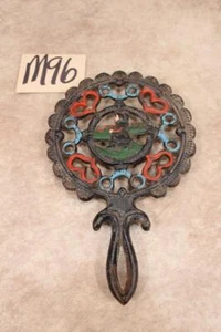 M96 VINTAGE BLACK CAST IRON AMISH BOY AND HEARTS TRIVET - Picture 1 of 1