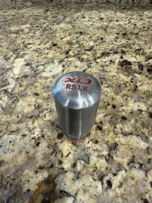 Botão de câmbio manual 2008 Scion XD RS 1.0 RAZO  - Imagem 1 de 4