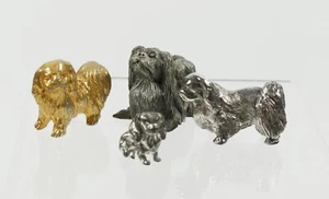 Colección de cuatro figuras miniatura de perro pekinés de metal mezclado - Imagen 1 de 3