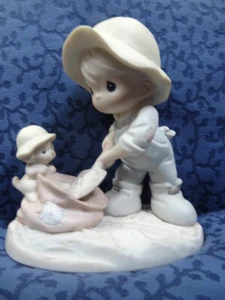 Precious Moments Figurine, 1993,'' Nothing Can Dampen The Spirit of Caring .'' - Picture 1 of 6