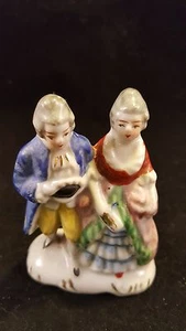 Occupied Japan  Colonial man & woman ceramic figurine - Picture 1 of 4