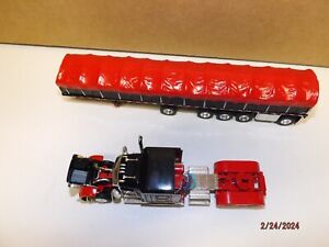 DCP 1/64 KENWORTH WITH COVERED WAGON 5 AXLE TRAILER