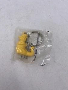 Vintage Tupperware Yellow Douglas Dirtwalker Keyring Sealed in Bag - Picture 1 of 5