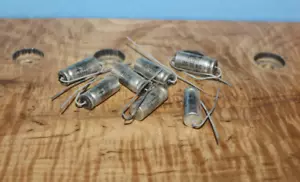 Tappi condensatori Sprague TE1211 vintage 100 uF 25 VDC NOS quantità 7 - Foto 1 di 3