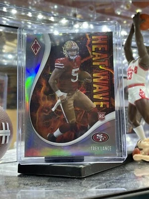 TREY LANCE 2021 PANINI PHOENIX SILVER PRIZM HEAT WAVE RC #15 - Image 1 of 4