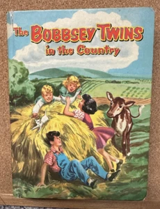 THE BOBBSEY TWINS IN THE COUNTRY VINTAGE HARDCOVER LAURA LEE HOPE WHITMAN (1953) - Imagen 1 de 8