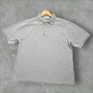 Polo corto Yves Saint Laurent para hombre talla XL gris manga corta logotipo YSL - Imagen 1 de 8