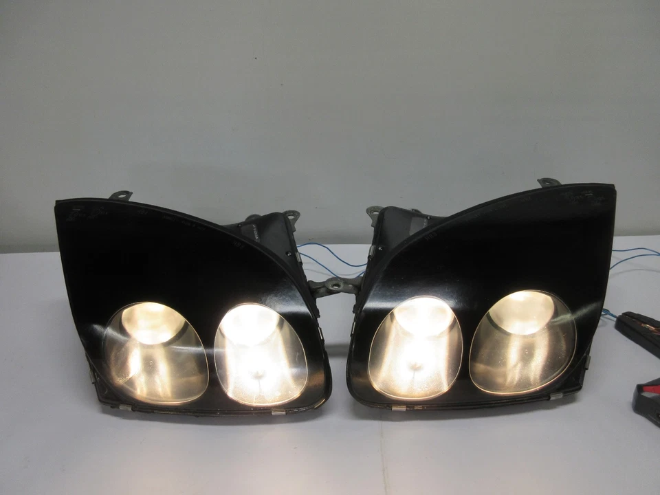 Faro lado conductor y pasajero Mitsubishi 3000GT 1995 1996 1997 1998 en negro Foto 1 de 4