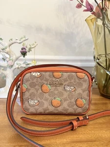 Borsa fotocamera Coach Mini Jamie in tela firmata con stampa arancione nuova con etichetta autentica - Foto 1 di 8