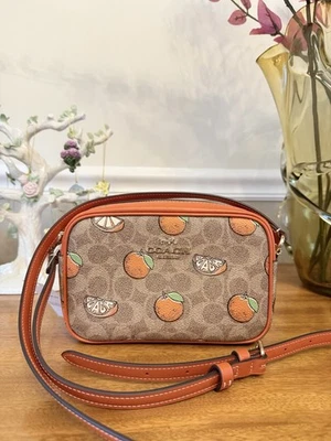 Bolso para cámara Coach Mini Jamie en lona exclusiva con estampado naranja nuevo con etiquetas auténtico Foto 1 de 4