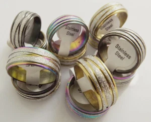 Venta al por mayor 48 piezas 8 mm cruce mezcla de cuatro colores anillo de acero inoxidable esmerilado - Imagen 1 de 3