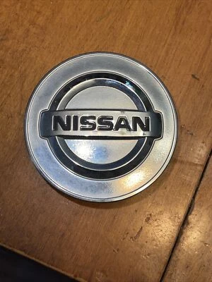 Tapa central rueda OEM NISSAN 350Z / 370Z / ALTIMA / GT-R / HOJA 40343-AU51A Foto 1 de 2
