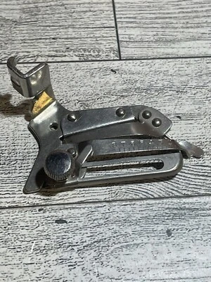 Singer 35931 Adjustable Hemmer Sewing Machine Attachment - Image 1 of 4
